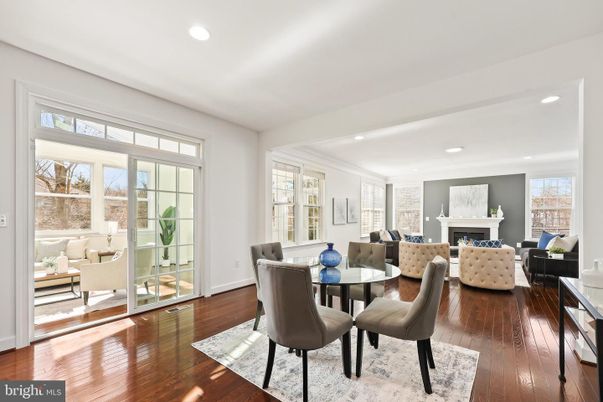 Dining room, Fireplace, Interior, Living room, Recessed Lighting, Wood Texture Flooring