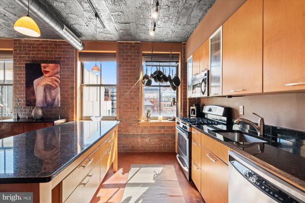 Interior, Kitchen, Pendant Lights, Stainless Steel Appliances, Stone Walls
