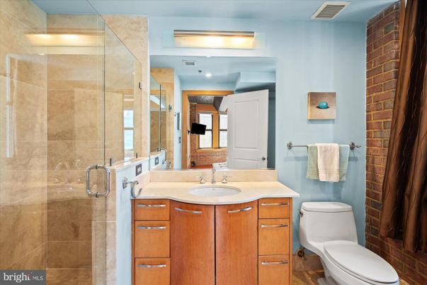 Bathroom, Glass Shower, Interior, Recessed Lighting, Stone Walls