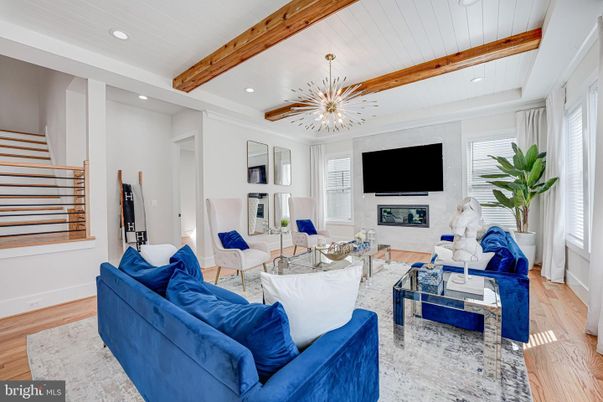 Fireplace, Interior, Living room, Pendant Lights, Recessed Lighting, Wooden Beams, Wood Texture Flooring