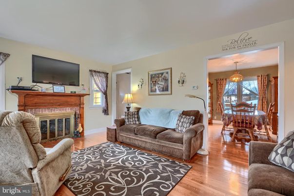 Chandelier, Dining room, Fireplace, Interior, Living room, Wood Texture Flooring