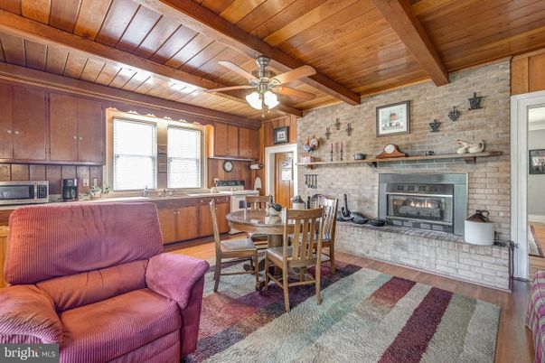 Dining room, Fireplace, Interior, Kitchen, Stone Walls, Wooden Beams, Wooden Ceilings, Wood Texture Flooring