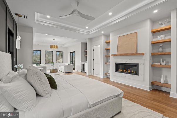 Bedroom, Fireplace, Interior, Pendant Lights, Recessed Lighting, Wood Texture Flooring
