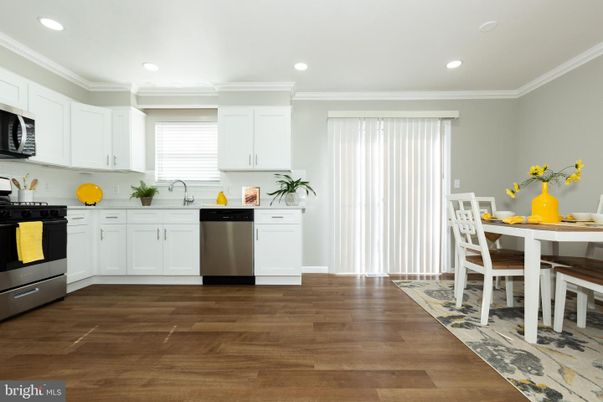 Dining room, Interior, Kitchen, Recessed Lighting, Stainless Steel Appliances, Wood Texture Flooring