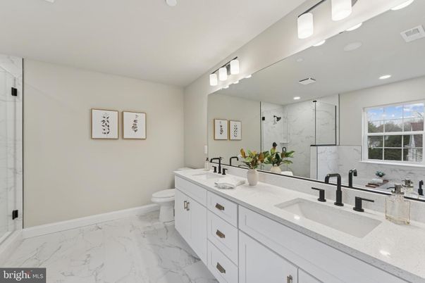 Bathroom, Dual Sink Vanities, Glass Shower, Interior, Marble, Marble Walls, Recessed Lighting