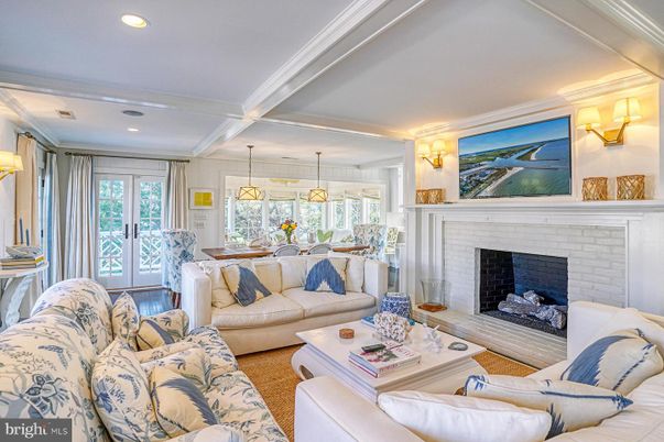 Dining room, Fireplace, Interior, Living room, Pendant Lights, Recessed Lighting, Wood Texture Flooring
