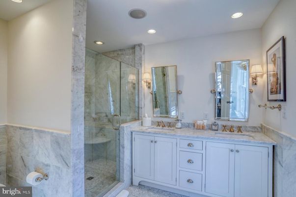Bathroom, Dual Sink Vanities, Glass Shower, Interior, Marble Walls, Recessed Lighting