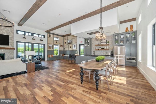 Dining room, Fireplace, Interior, Kitchen, Living room, Pendant Lights, Recessed Lighting, Stainless Steel Appliances, Stone Walls, Wooden Beams, Wood Texture Flooring