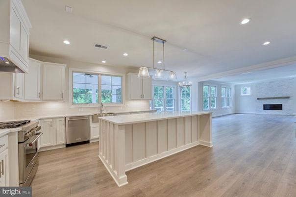 Fireplace, Interior, Kitchen, Pendant Lights, Recessed Lighting, Stainless Steel Appliances, Wood Texture Flooring