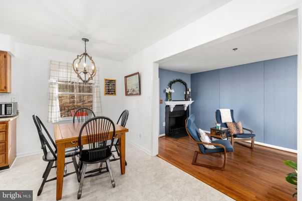 Chandelier, Dining room, Fireplace, Interior, Pendant Lights, Wood Texture Flooring