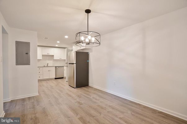 Chandelier, Interior, Kitchen, Pendant Lights, Recessed Lighting, Stainless Steel Appliances, Wood Texture Flooring