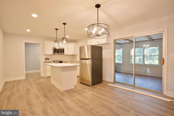 Chandelier, Interior, Kitchen, Pendant Lights, Recessed Lighting, Stainless Steel Appliances, Wood Texture Flooring