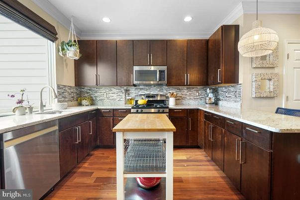 Interior, Kitchen, Pendant Lights, Recessed Lighting, Stainless Steel Appliances, Wood Texture Flooring