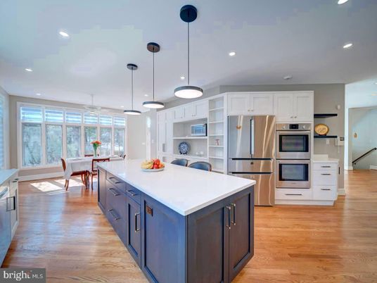 Dining room, Interior, Kitchen, Pendant Lights, Recessed Lighting, Stainless Steel Appliances, Wood Texture Flooring