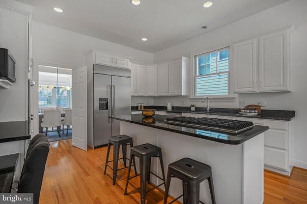 Dining room, Interior, Kitchen, Recessed Lighting, Stainless Steel Appliances, Wood Texture Flooring