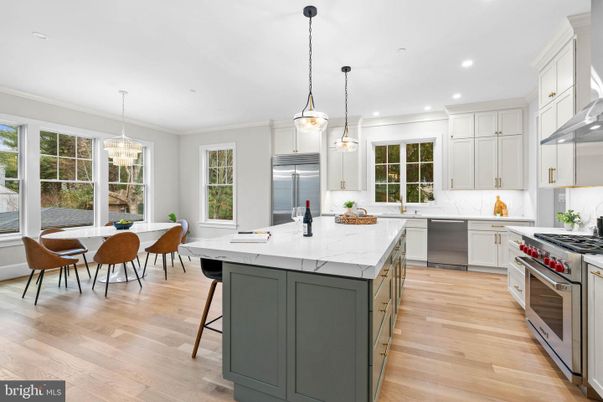 Chandelier, Dining room, Interior, Kitchen, Pendant Lights, Recessed Lighting, Stainless Steel Appliances, Wood Texture Flooring