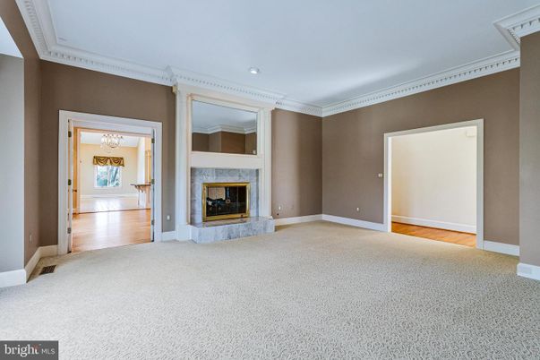 Chandelier, Empty room, Fireplace, Interior, Recessed Lighting, Wood Texture Flooring