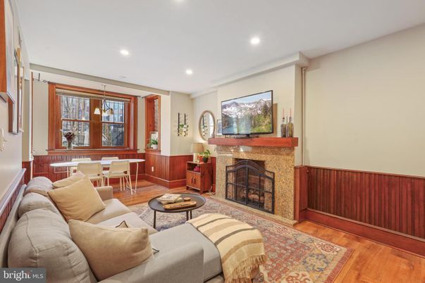 Dining room, Fireplace, Interior, Living room, Pendant Lights, Recessed Lighting, Wood Texture Flooring