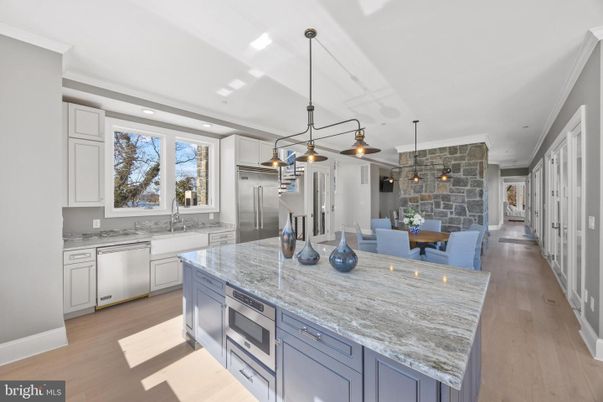 Dining room, Interior, Kitchen, Pendant Lights, Recessed Lighting, Stainless Steel Appliances, Stone Walls, Wood Texture Flooring