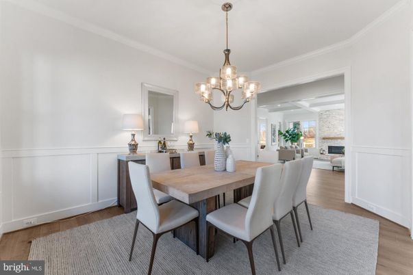 Chandelier, Dining room, Fireplace, Interior, Wood Texture Flooring