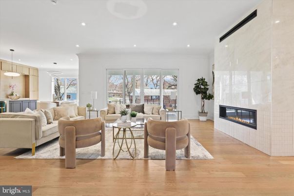 Fireplace, Interior, Living room, Marble Walls, Pendant Lights, Recessed Lighting, Wood Texture Flooring
