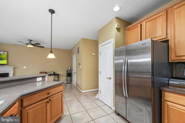 Fireplace, Interior, Kitchen, Pendant Lights, Recessed Lighting, Stainless Steel Appliances