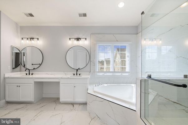 Bathroom, Dual Sink Vanities, Glass Shower, Interior, Marble, Marble Walls, Recessed Lighting