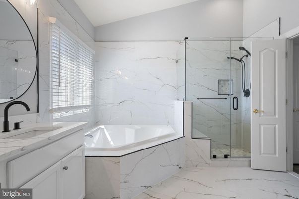 Bathroom, Dual Sink Vanities, Glass Shower, Interior, Marble, Marble Walls