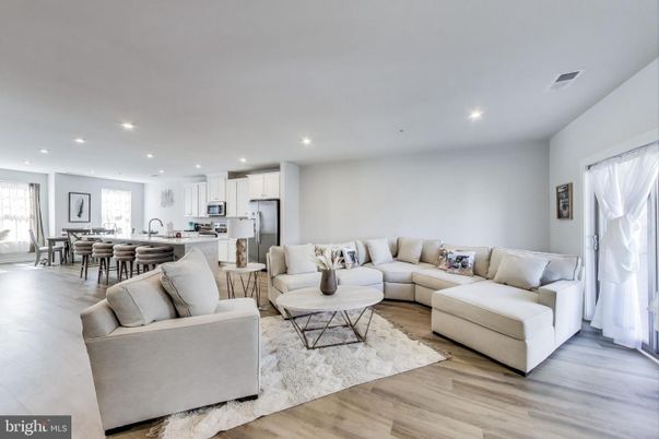Dining room, Interior, Kitchen, Living room, Recessed Lighting, Stainless Steel Appliances, Wood Texture Flooring