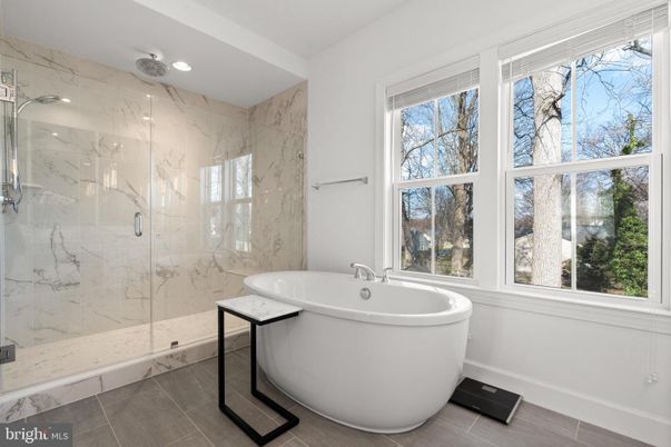 Bathroom, Free Standing Baths, Glass Shower, Interior, Marble Walls, Recessed Lighting