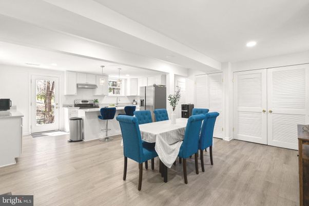 Dining room, Interior, Kitchen, Pendant Lights, Recessed Lighting, Stainless Steel Appliances, Wood Texture Flooring