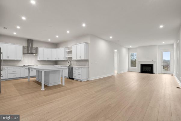 Empty room, Fireplace, Interior, Kitchen, Recessed Lighting, Wood Texture Flooring