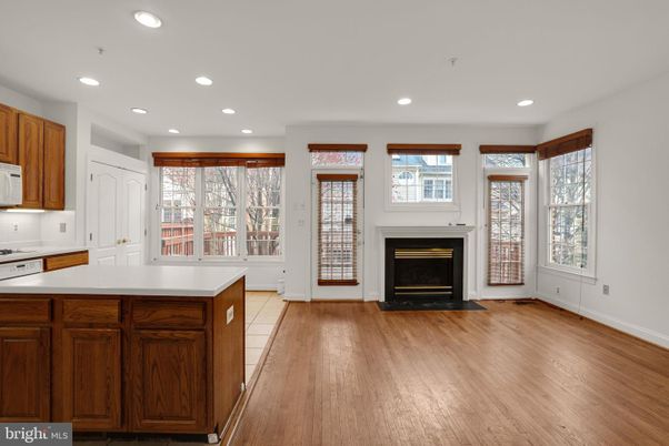 Fireplace, Interior, Kitchen, Recessed Lighting, Wood Texture Flooring