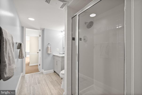 Bathroom, Glass Shower, Interior, Recessed Lighting, Wood Texture Flooring
