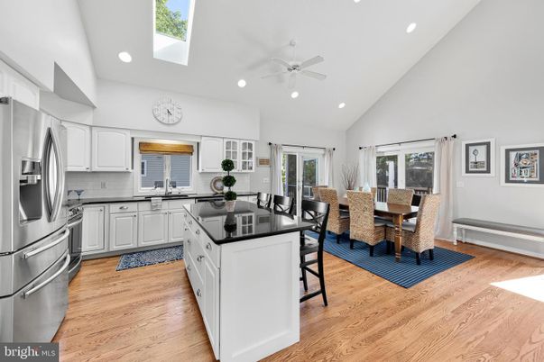 Dining room, Interior, Kitchen, Recessed Lighting, Stainless Steel Appliances, Wood Texture Flooring