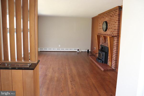 Empty room, Fireplace, Interior, Stone Walls, Wood Texture Flooring