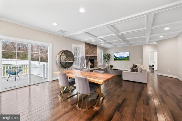 Dining room, Fireplace, Interior, Living room, Recessed Lighting, Wood Texture Flooring