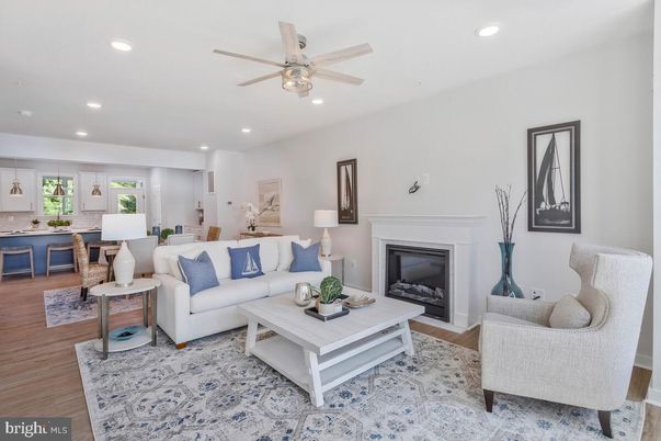 Dining room, Fireplace, Interior, Living room, Recessed Lighting, Wood Texture Flooring