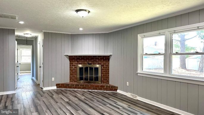 Fireplace, Interior, Recessed Lighting, Stone Walls, Wood Texture Flooring