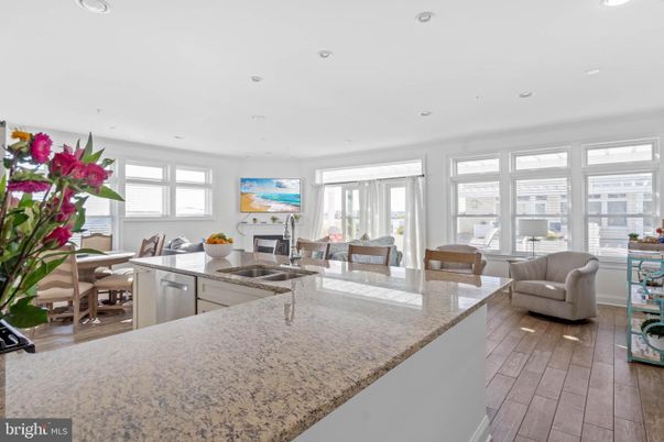 Dining room, Fireplace, Interior, Kitchen, Living room, Recessed Lighting, Wood Texture Flooring