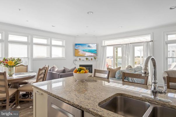 Dining room, Fireplace, Interior, Kitchen, Living room, Recessed Lighting, Wood Texture Flooring
