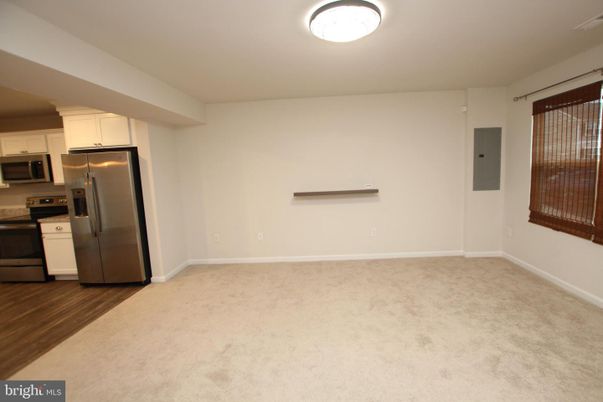 Empty room, Interior, Kitchen, Stainless Steel Appliances, Wood Texture Flooring