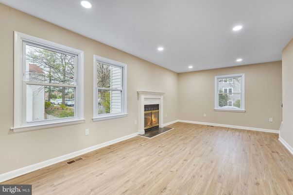 Empty room, Fireplace, Interior, Recessed Lighting, Wood Texture Flooring