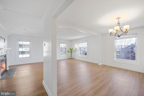 Chandelier, Empty room, Fireplace, Interior, Recessed Lighting, Wood Texture Flooring