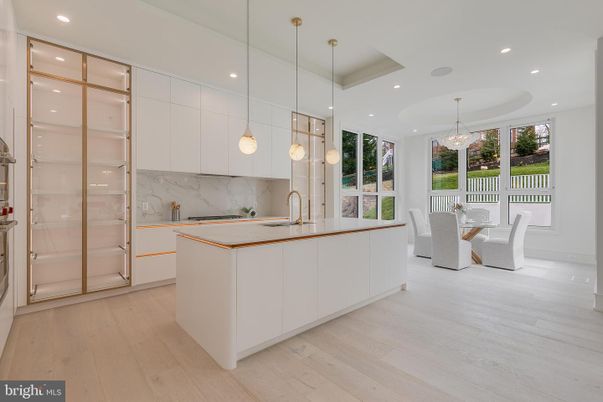 Chandelier, Dining room, Interior, Kitchen, Marble Walls, Pendant Lights, Recessed Lighting, Wood Texture Flooring