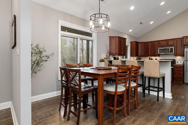 Dining room, Interior, Kitchen, Pendant Lights, Recessed Lighting, Stainless Steel Appliances, Wood Texture Flooring