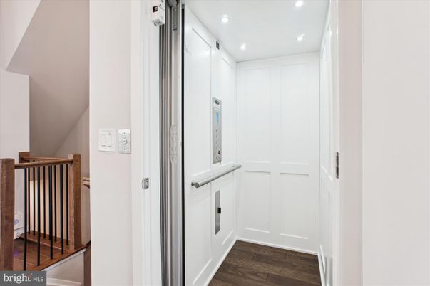 Elevator, Interior, Recessed Lighting, Wood Texture Flooring