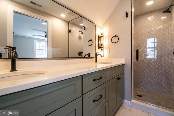 Bathroom, Dual Sink Vanities, Glass Shower, Interior, Marble, Recessed Lighting