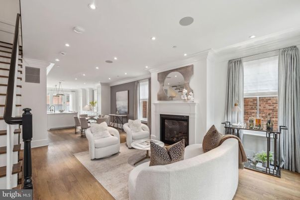 Dining room, Fireplace, Interior, Living room, Pendant Lights, Recessed Lighting, Wood Texture Flooring