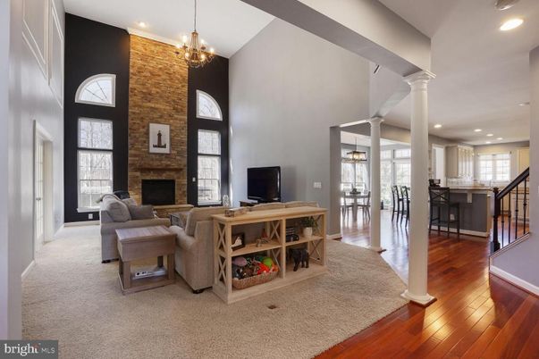 Chandelier, Dining room, Fireplace, Interior, Kitchen, Living room, Pendant Lights, Recessed Lighting, Wood Texture Flooring